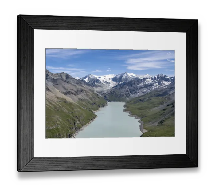 Framed Print : Blue mountain lake in a mountain landscape with glaciers