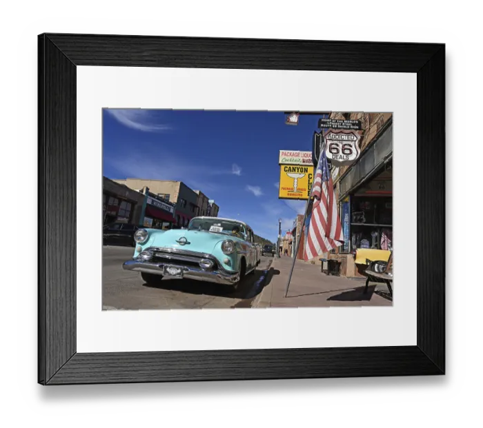 Framed Print : Vintage car parked in front of souvenir shop on Route 66