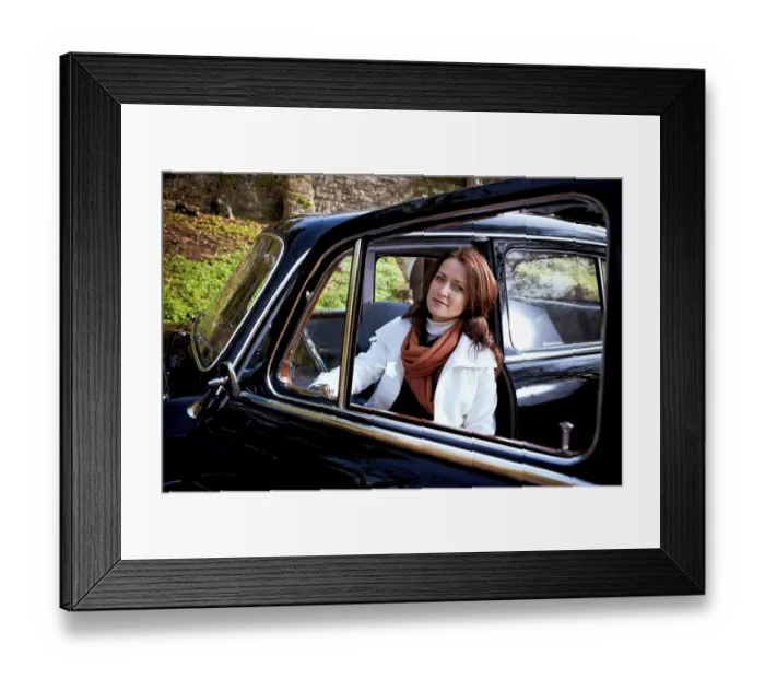 Framed Print : Young woman in a vintage MB vehicle
