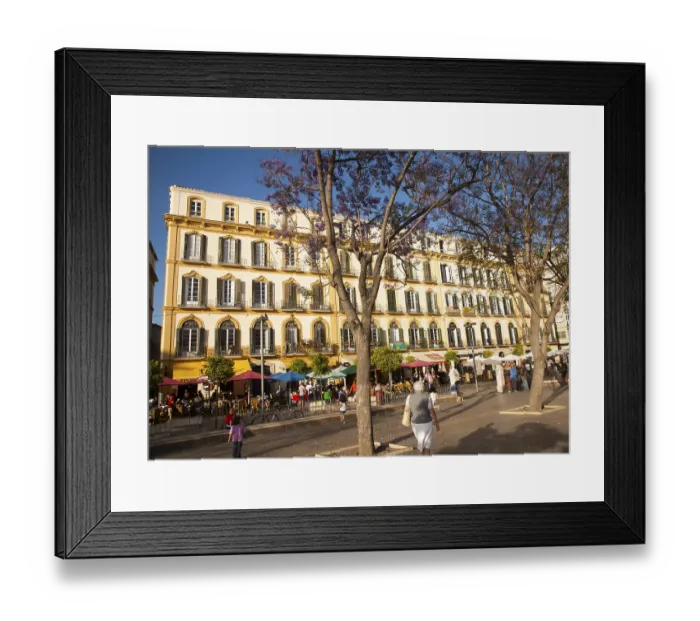 Framed Print : People sitting outside popular cafes on a sunny afternoon in Plaza de la Merced