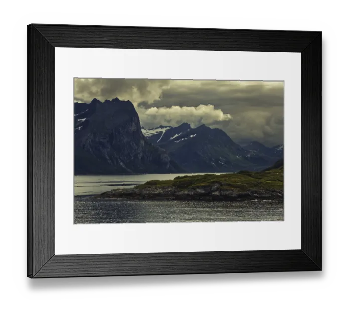 Framed Print : Dramatic mountain silhouette under dark clouds with a calm lake Framed Print : Dramatic mountain silhouette under dark clouds with a calm lake