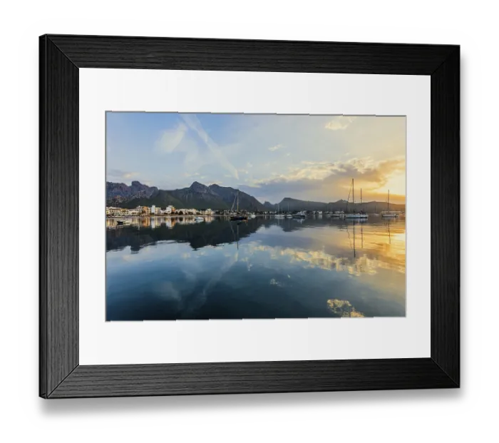 Framed Print : Village by the sea and mountains at sunrise
