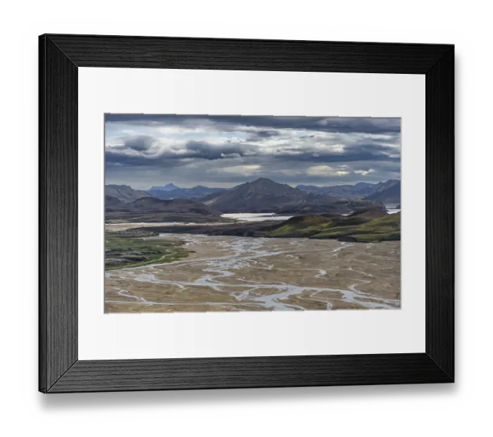 Framed Print : Meandering river in volcanic landscape with mountains