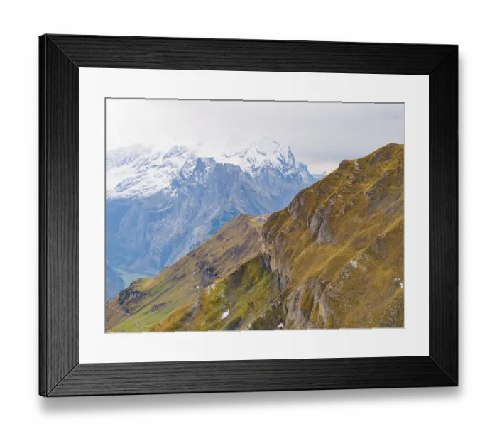 Framed Print : Panoramic view of an autumnal mountain landscape with snow-covered peaks and rocky slopes