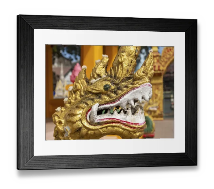 Framed Print : Close-up of gilded Naga, guardian deity