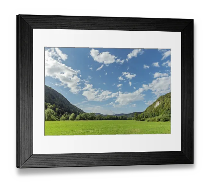 Framed Print : A large, open field with a clear blue sky and a few clouds Framed Print : A large, open field with a clear blue sky and a few clouds