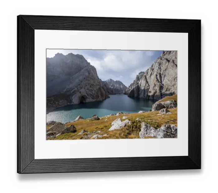 Framed Print : Mountain lake Kol Suu rocky steep mountains
