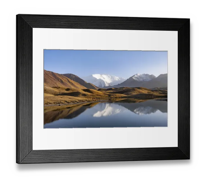 Framed Print : Mountains reflected in a small mountain lake