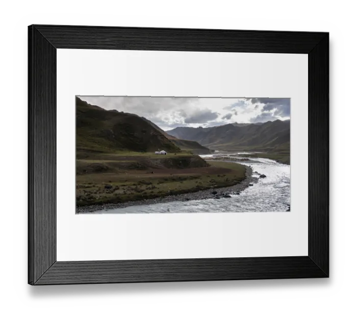 Framed Print : Yurt by a river, Desolate mountain landscape