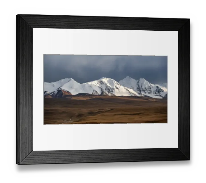 Framed Print : Glaciated and snow-capped mountains