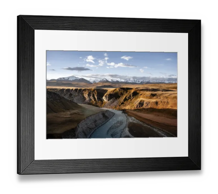 Framed Print : Mountain stream Sary Jaz, behind Glaciated and snow-covered mountains Framed Print : Mountain stream Sary Jaz, behind Glaciated and snow-covered mountains