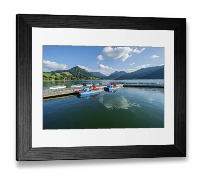 Framed Print : Electric boats and pedal boats at jetty
