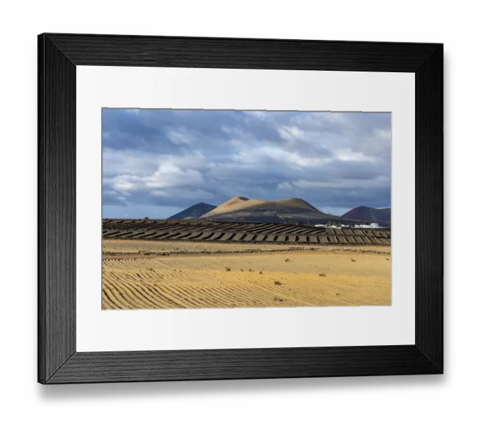 Framed Print : Volcanic crater, Vast fields of volcanic rock lead to distant Framed Print : Volcanic crater, Vast fields of volcanic rock lead to distant