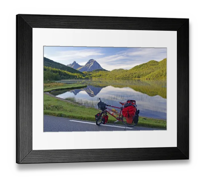 Framed Print : Packed touring bike in front of mountain lake and steep mountains