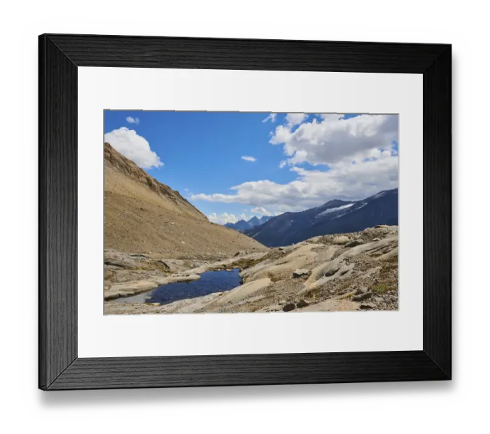Framed Print : Puddle next to Wasserfallwinkelkeesee in the mountains (Grossglockner) in summer on a sunny day