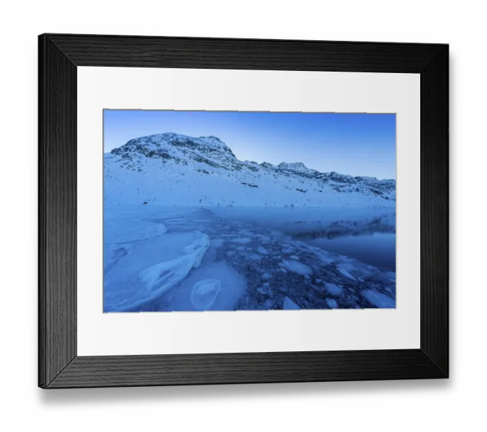 Framed Print : Ice structures in the black ice of the frozen Lago Bianco in the Swiss mountains