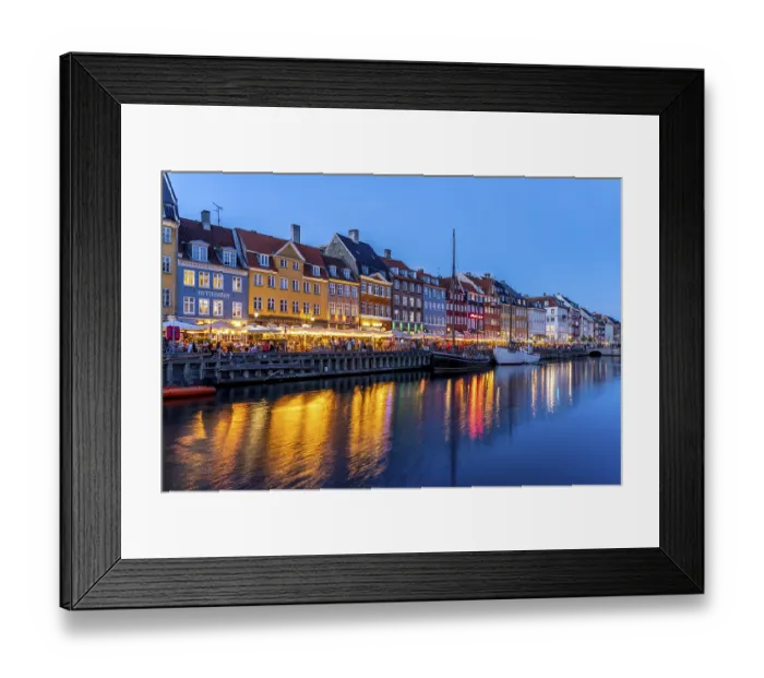 Framed Print : Colourful houses, restaurants and historic ships on the Nyhavn canal and harbour at dusk Framed Print : Colourful houses, restaurants and historic ships on the Nyhavn canal and harbour at dusk