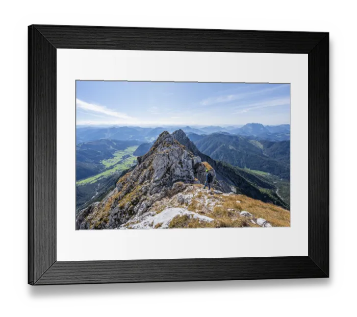 Framed Print : Hiker with climbing helmet, on hiking trail at a ridge Framed Print : Hiker with climbing helmet, on hiking trail at a ridge