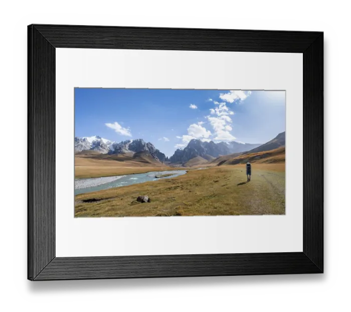 Framed Print : Mountaineer hiking to the mountain lake Kol Suu Framed Print : Mountaineer hiking to the mountain lake Kol Suu