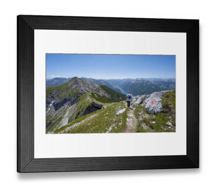 Framed Print : Mountaineer on the hiking trail on the summit ridge of the Unnuetz Framed Print : Mountaineer on the hiking trail on the summit ridge of the Unnuetz