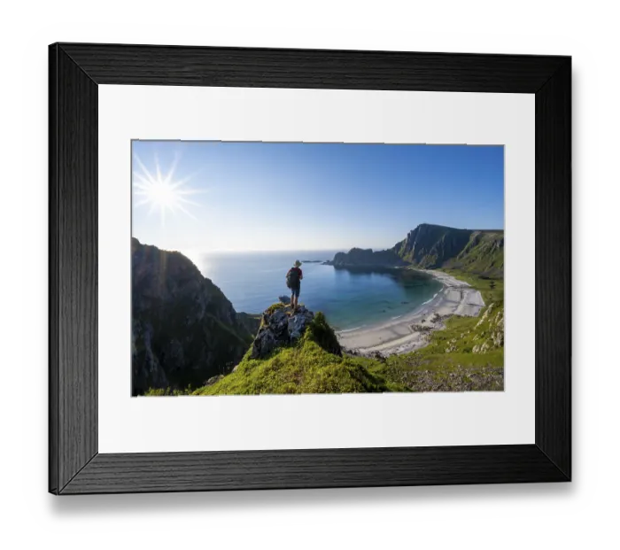 Framed Print : Mountaineer with view of coastal landscape