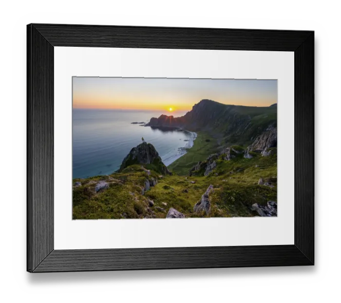 Framed Print : Climber on rocks in front of picturesque landscape Framed Print : Climber on rocks in front of picturesque landscape