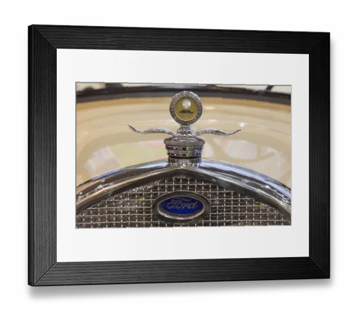 Framed Print : Front with radiator grille and logo of a Ford classic car