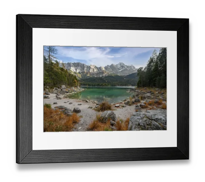 Framed Print : Shore with rocks, Eibsee lake with Zugspitze massif and Zugspitze Framed Print : Shore with rocks, Eibsee lake with Zugspitze massif and Zugspitze