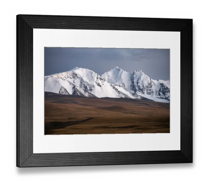 Framed Print : Glaciated and snow-capped mountains
