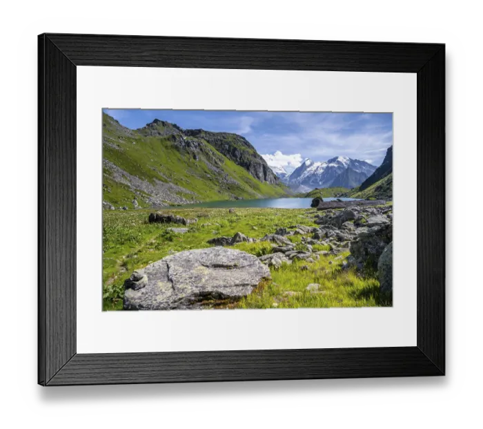 Framed Print : Mountain lake Lac de Louvie with glaciated summit of the Grand Combin