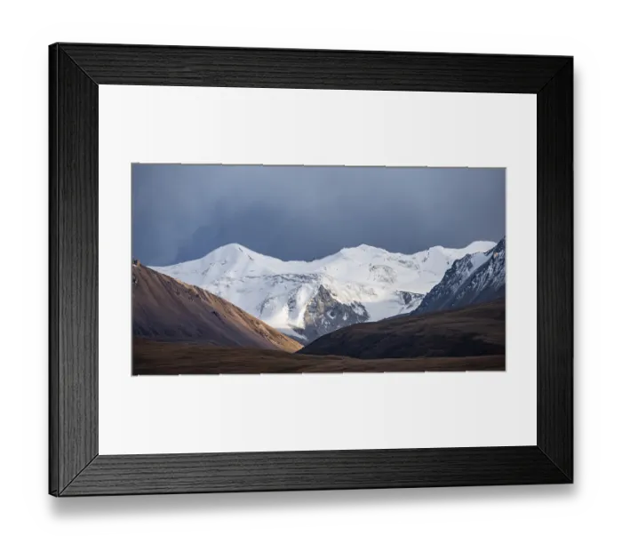Framed Print : Glaciated and snow-capped mountains