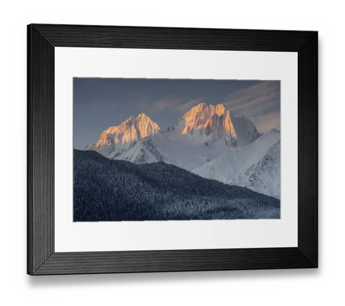 Framed Print : Snowy mountains and peaks in the morning light