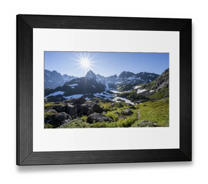 Framed Print : Hiking trail, sun shining on mountains with snow