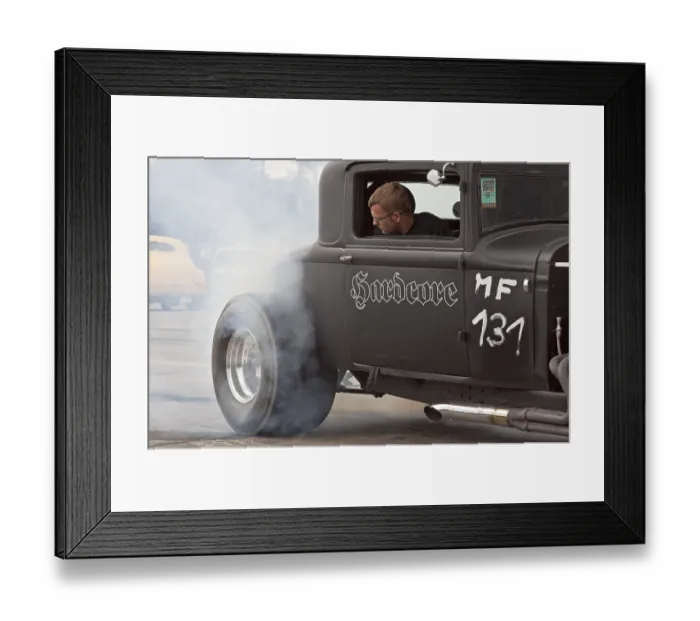 Framed Print : Participant in the Road Runner Race 61 at the warm up of his tires before the start