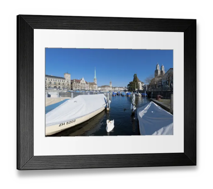 Framed Print : Boats on the Limmat River, historic district of Zurich with Johanneskirche church Framed Print : Boats on the Limmat River, historic district of Zurich with Johanneskirche church