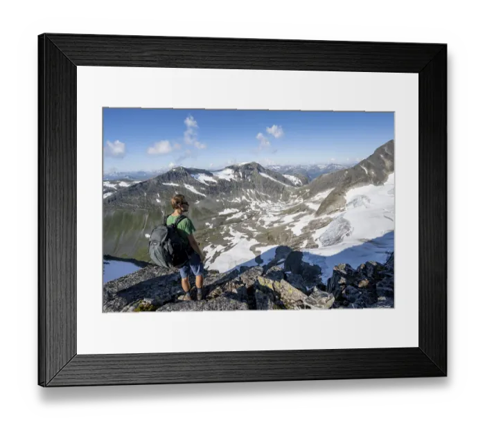Framed Print : Hikers climbing to the top of Skala