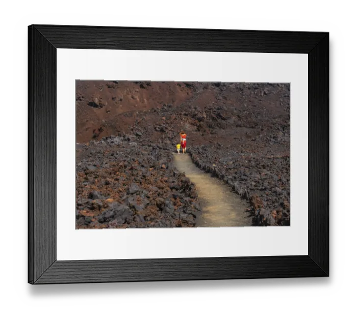 Framed Print : Walking through the beautiful red volcano in the town of Tamaduste on the coast of the island of El Hierro