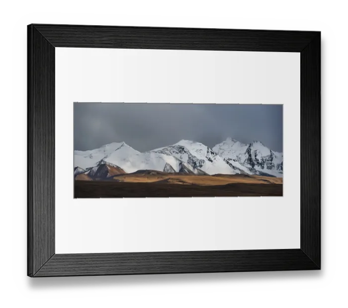 Framed Print : Glaciated and snow-capped mountains