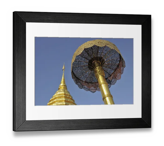 Framed Print : Golden pagoda (chedi) and golden umbrella (symbol of luck and power)