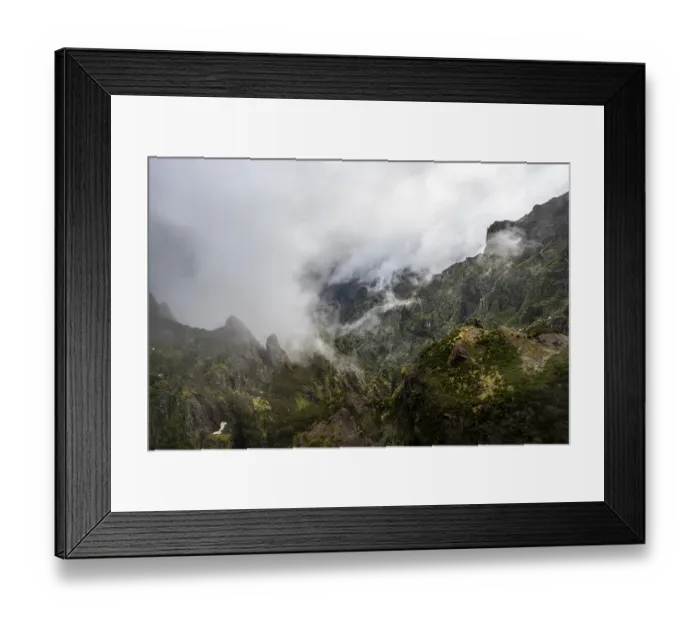 Framed Print : Steep cloudy mountain landscape with rock formations Framed Print : Steep cloudy mountain landscape with rock formations