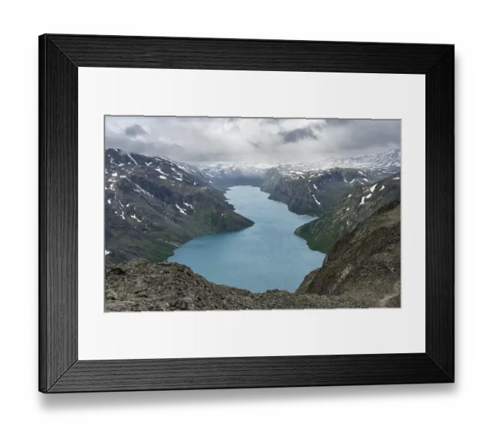 Framed Print : View of Lake Gjende and snowy mountains