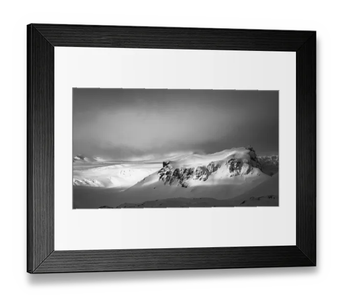 Framed Print : Fog, light and shadow on the snowy summit of Breidamerkurfjall