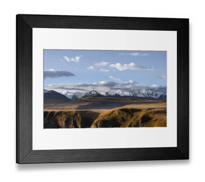 Framed Print : Glaciated and snow-covered mountains