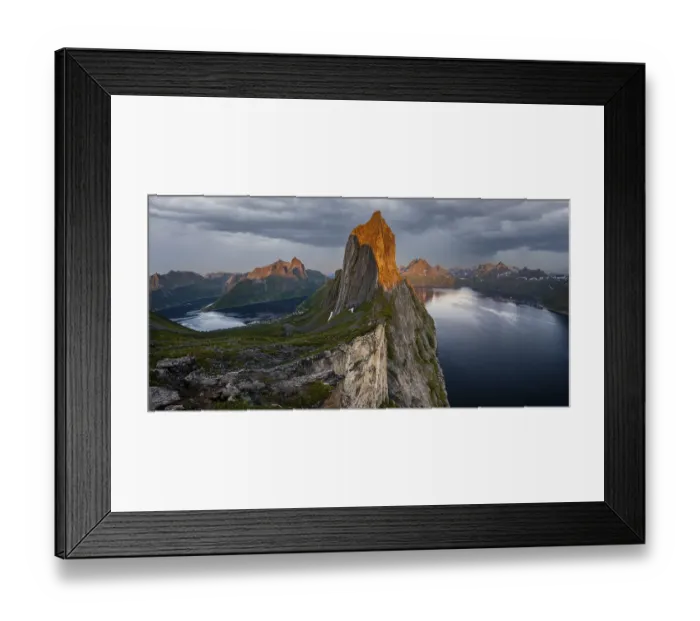 Framed Print : Dramatic clouds, evening mood, steep mountain Segla Framed Print : Dramatic clouds, evening mood, steep mountain Segla