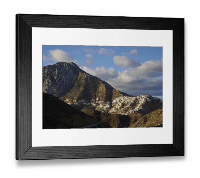 Framed Print : A rising village on a mountain ridge