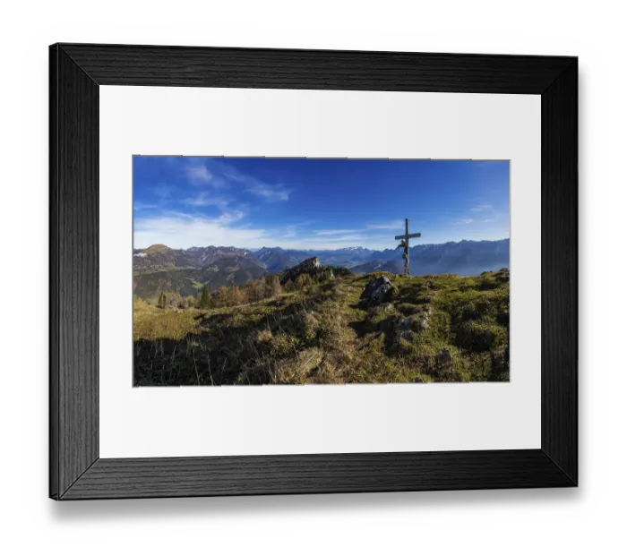 Framed Print : Drone shot, summit cross on the Schwarzer Berg with a view of the Lammertal with Dachstein massif and Tennengebirge