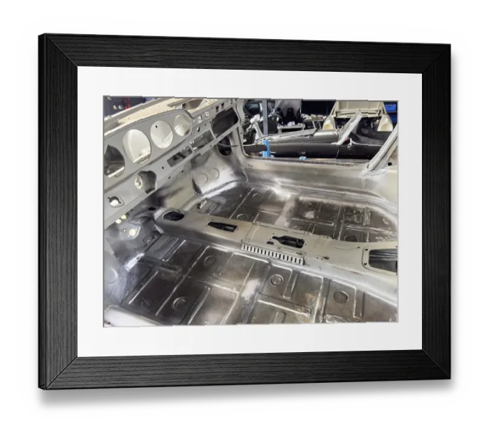 Framed Print : Gutted restored freshly galvanised partially galvanised passenger compartment empty interior of vintage historic