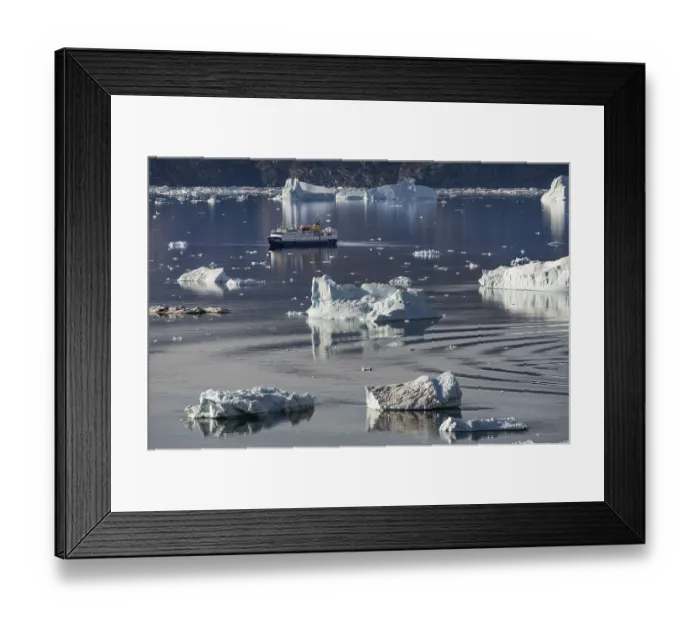 Framed Print : Expedition cruise ship between icebergs Framed Print : Expedition cruise ship between icebergs