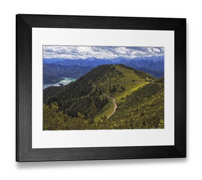 Framed Print : Panoramic view from the Herzogstand of wooded mountains and a winding hiking trail