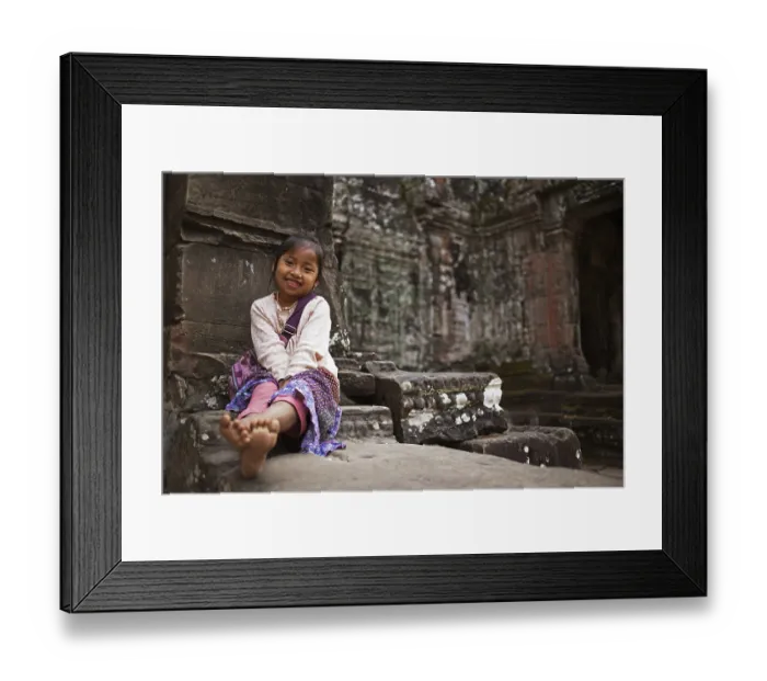 Framed Print : Child sitting in front of preah khan temple Framed Print : Child sitting in front of preah khan temple